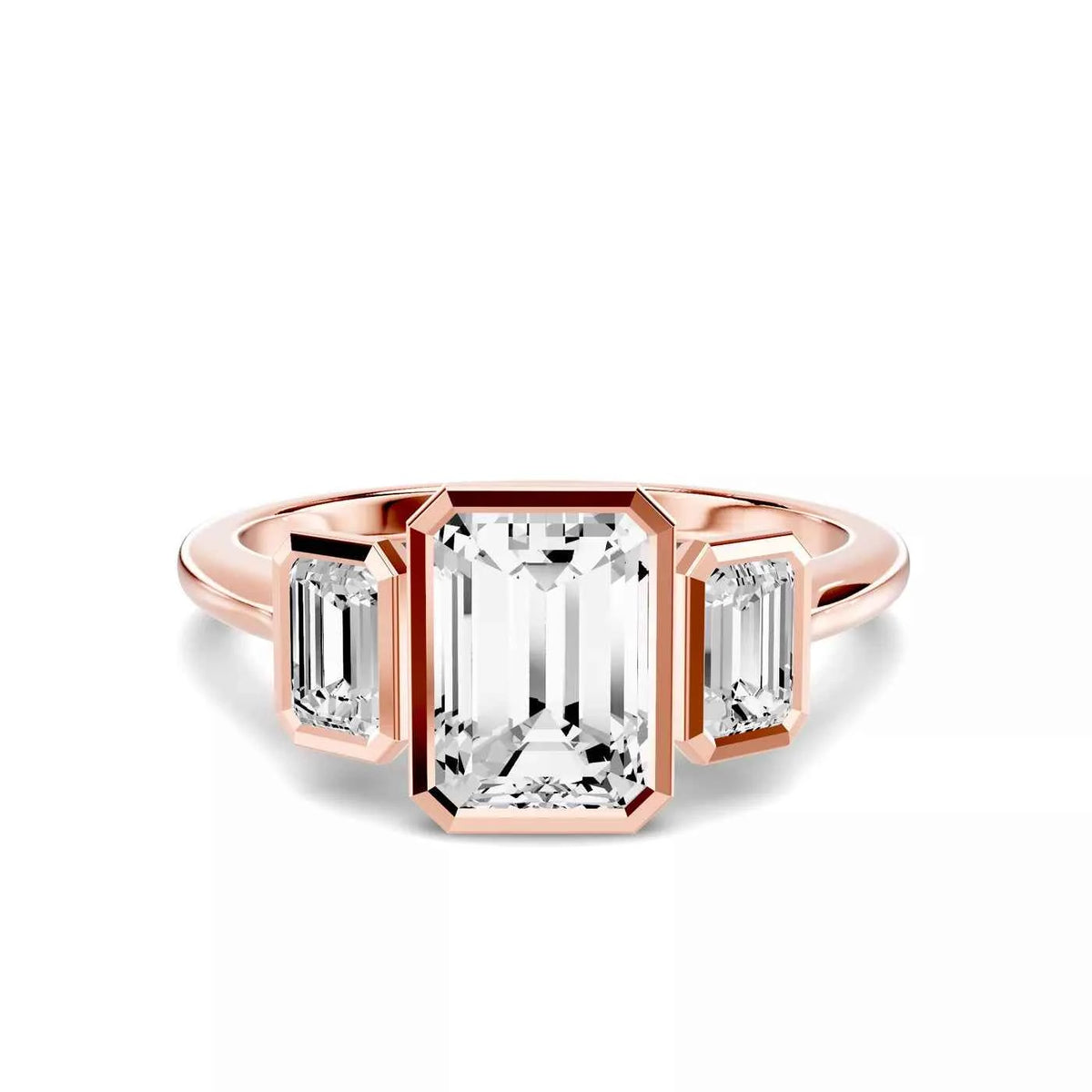 EMERALD THREE STONE BEZEL RING
