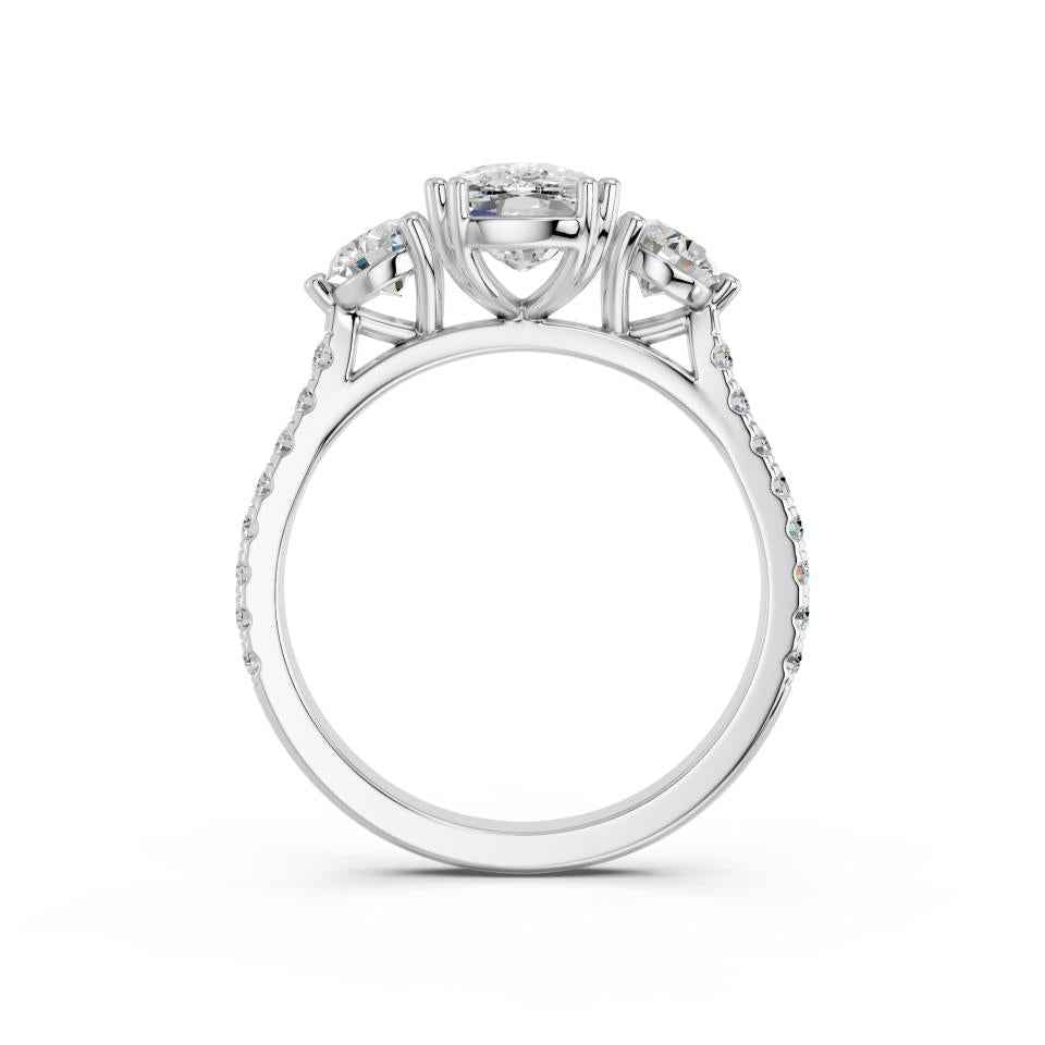 CUSHION THREE STONE WITH PAVE BAND