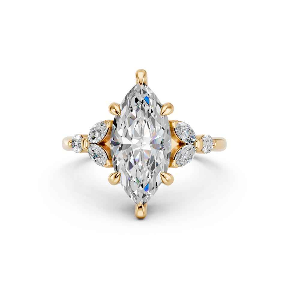 MARQUISE RING WITH SIDE STONES