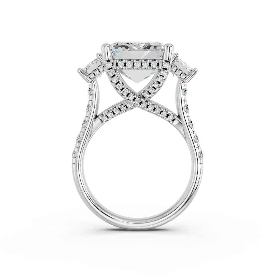 EMERALD THREE STONE RING WITH HIDDEN HALO AND PAVE BAND