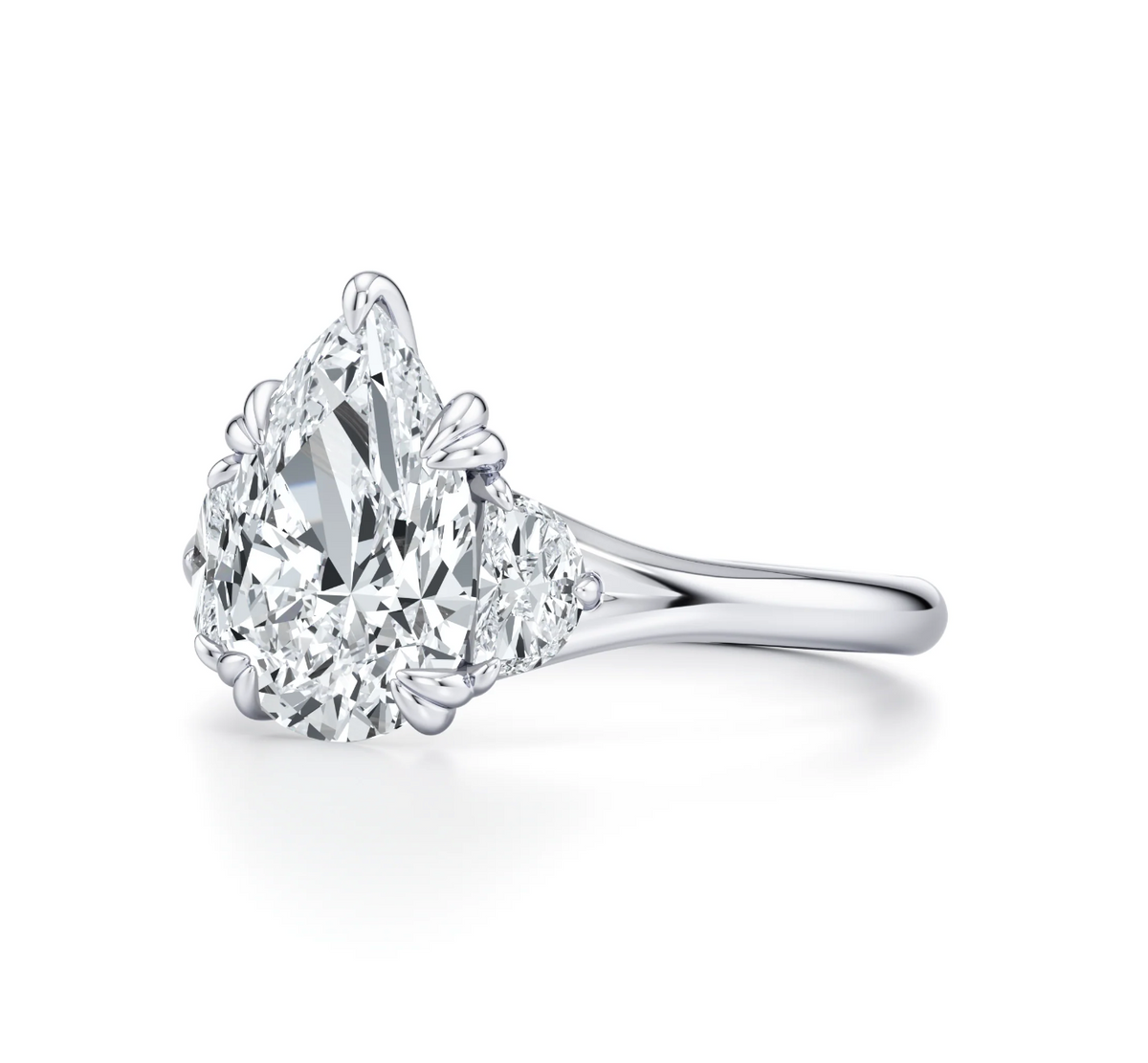 PEAR RING WITH HALF MOON SIDE STONES
