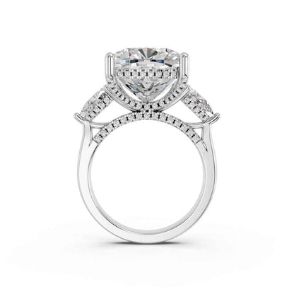 CUSHION THREE STONE RING WITH PEAR SIDE STONES AND HIDDEN HALO