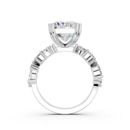 RADIANT RING WITH MARQUISE AND ROUND SIDE STONES