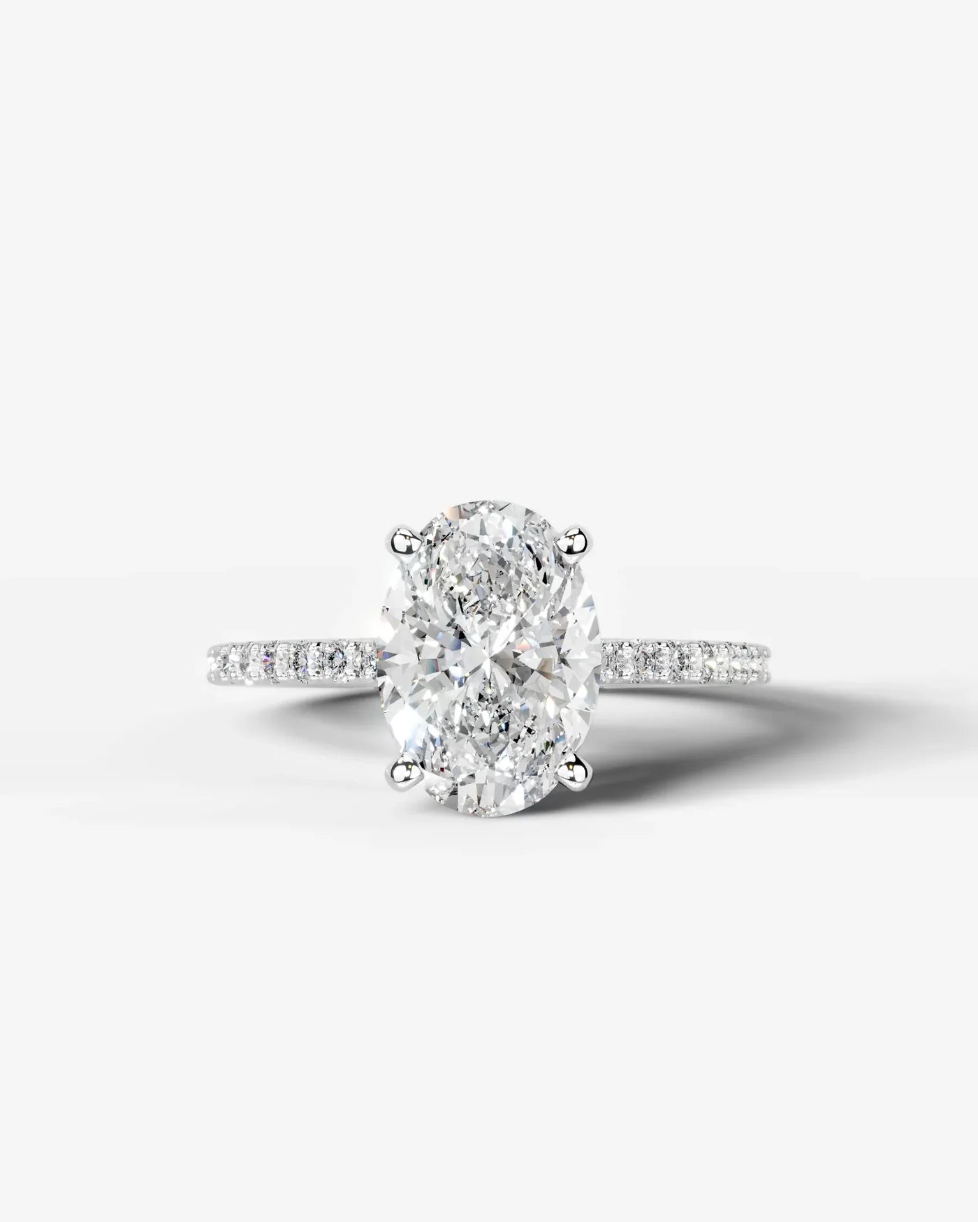 Oval Cut Solitaire Lab Grown Diamond Engagement Ring with Pavé Band | D VS1