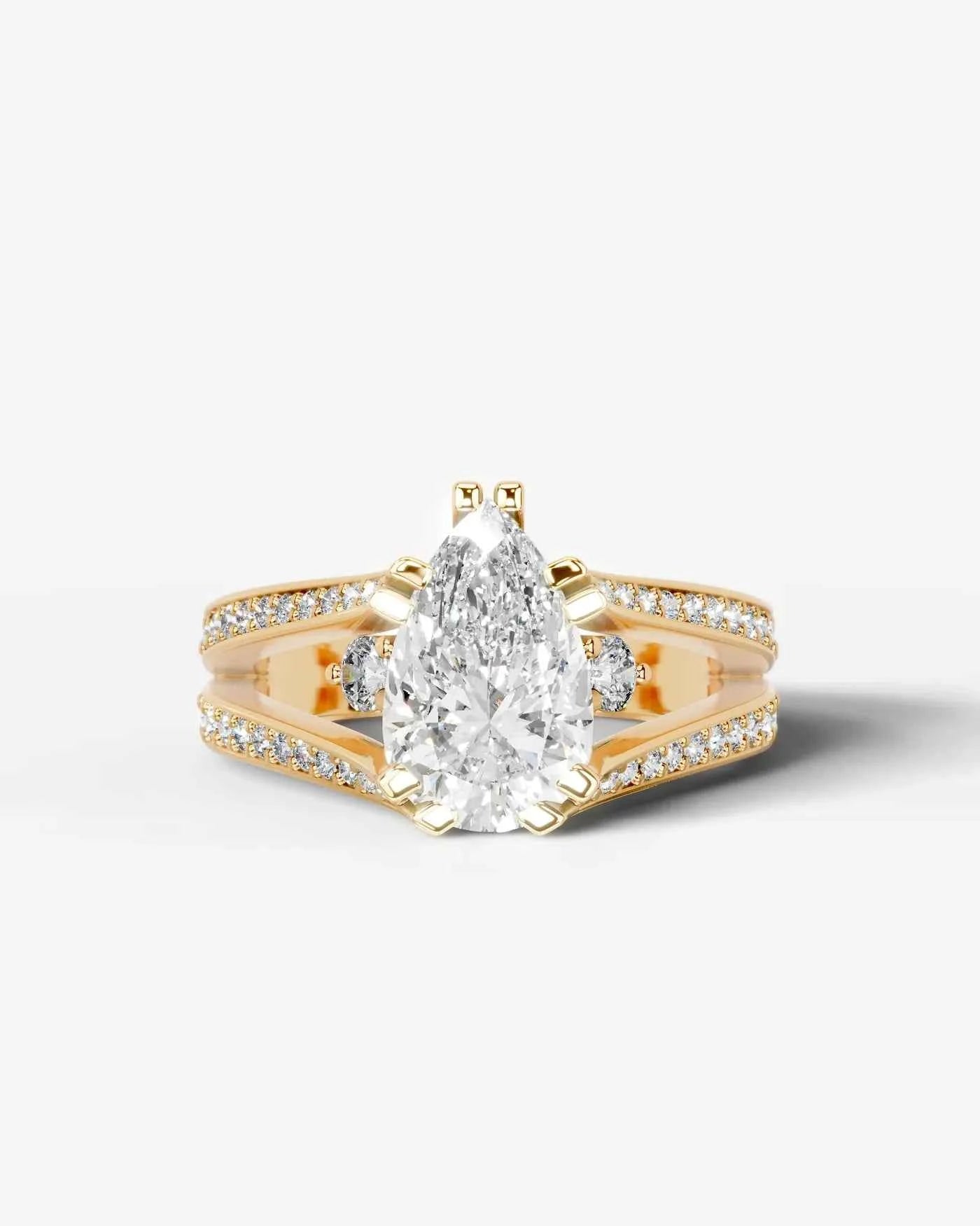 Pear Cut Lab Diamond Engagement Ring with split shank pave band and hidden halo| D VS1