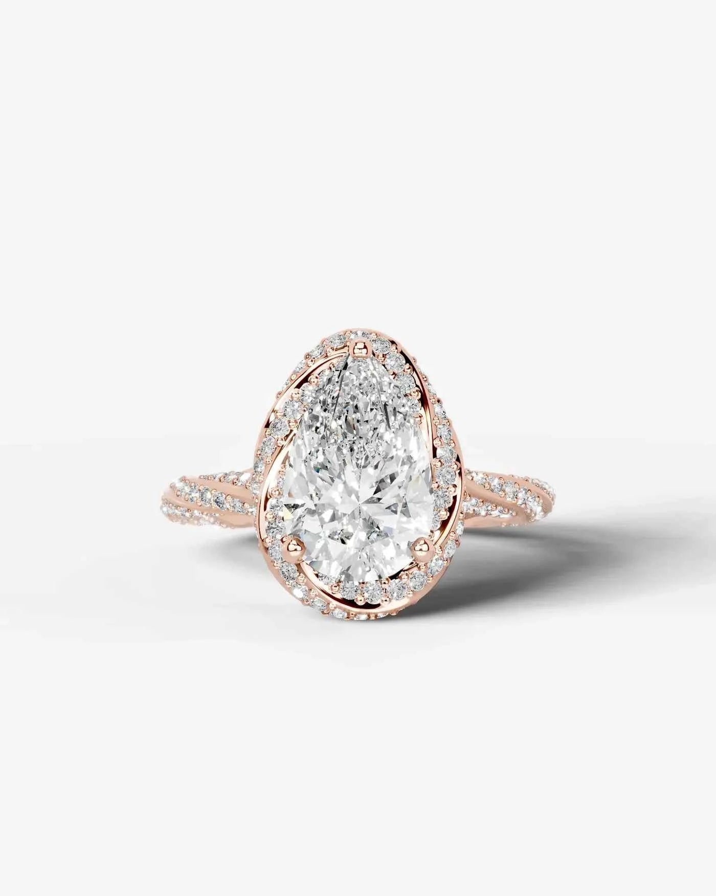 Pear Cut Lab Diamond Engagement Ring with double halo and twisted pave band| D VS1