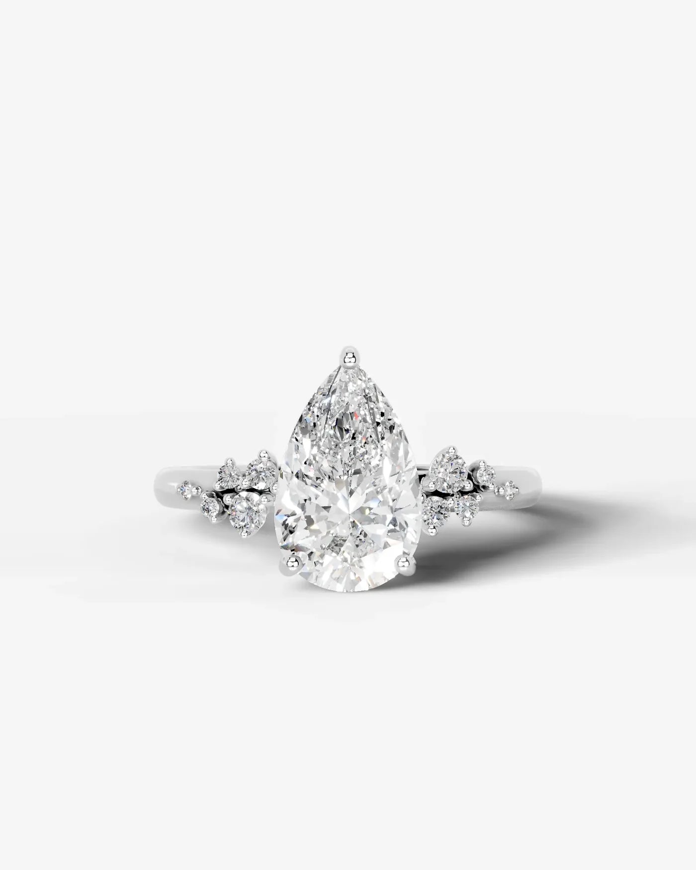 Pear Cut Lab Diamond Engagement Ring with floral side stones and Hidden halo| D VS1