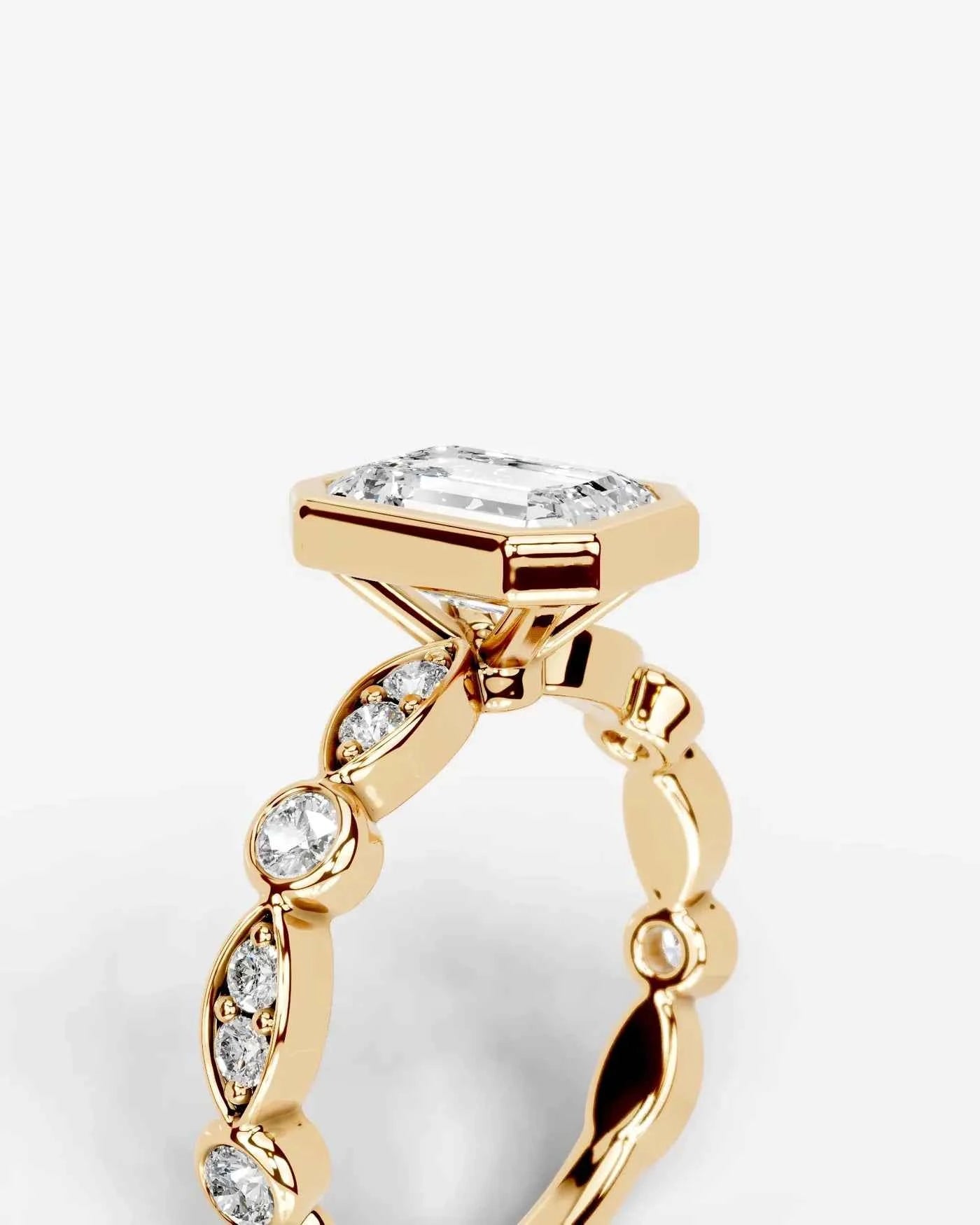 Emerald Cut Lab Diamond bezel Engagement Ring with bezel set side stones| D VS1