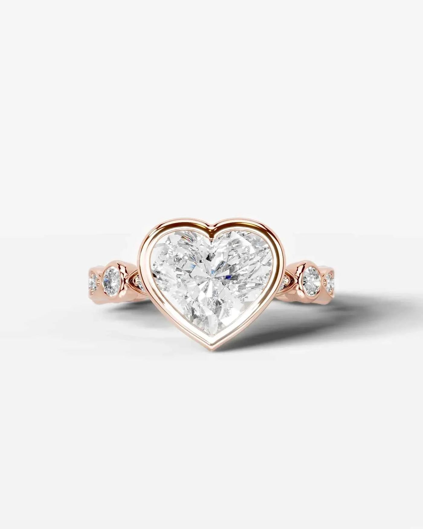 Heart Cut Lab Diamond bezel Engagement Ring with bezel set side stones| D VS1