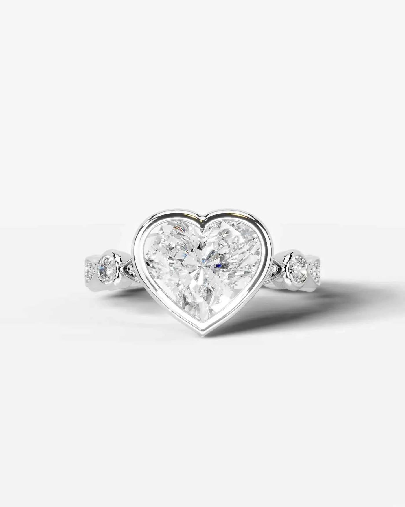 Heart Cut Lab Diamond bezel Engagement Ring with bezel set side stones| D VS1