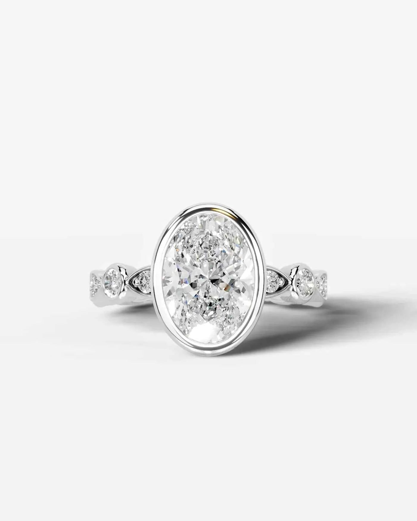 Oval Cut Lab Diamond bezel Engagement Ring with bezel set side stones| D VS1