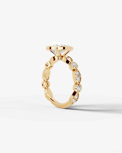 Pear Cut Lab Diamond bezel Engagement Ring with bezel set side stones| D VS1