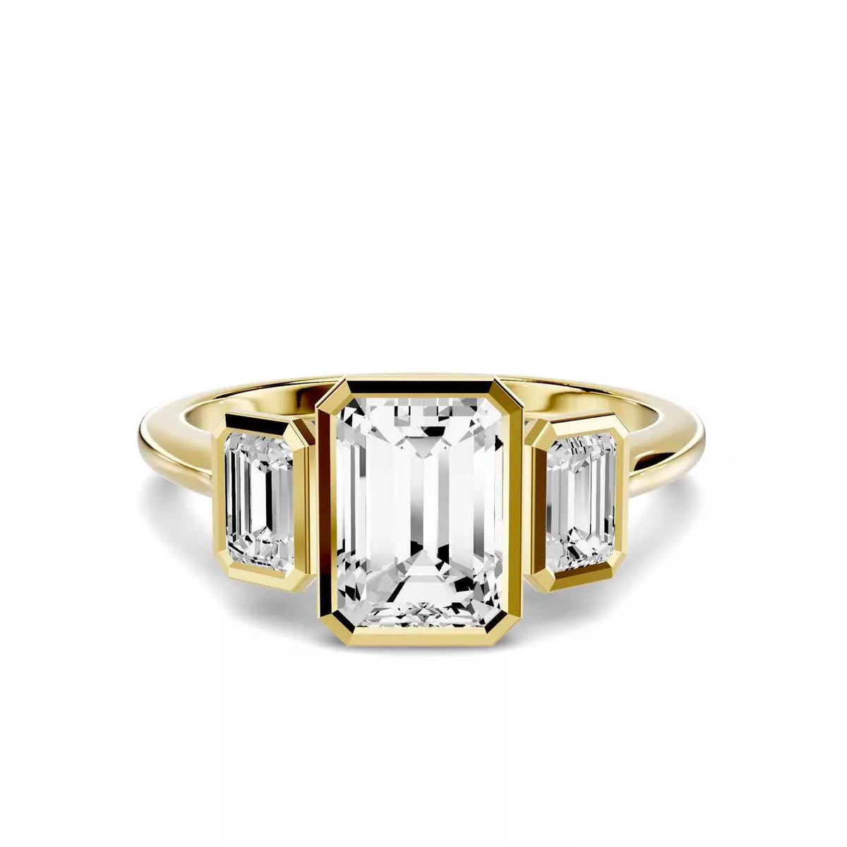 EMERALD THREE STONE BEZEL RING