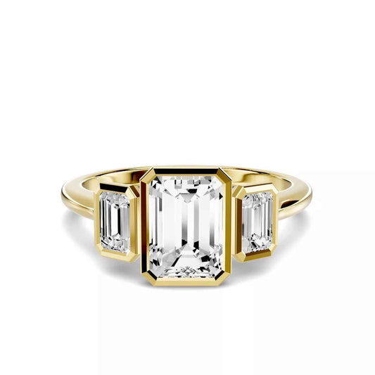 EMERALD THREE STONE BEZEL RING
