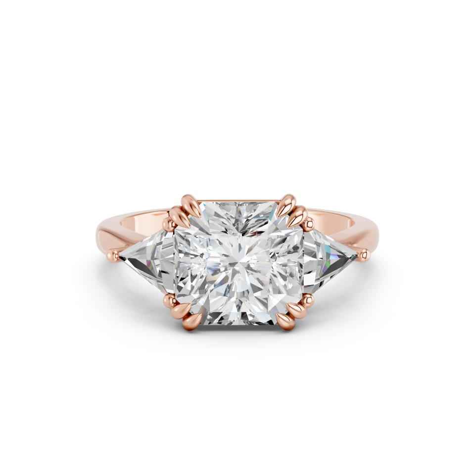 PRINCESS RING WITH TRIANGLE SIDE STONES