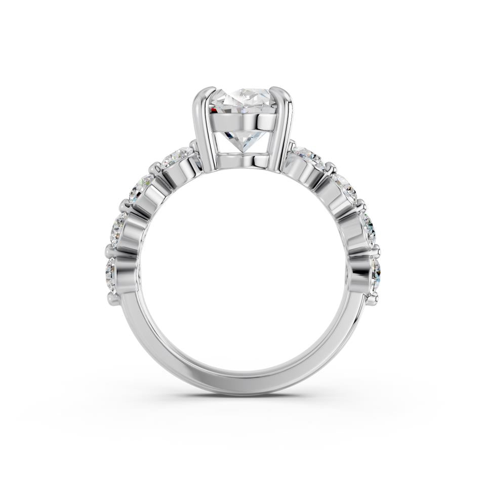 OVAL RING WITH ROUND SIDE STONES