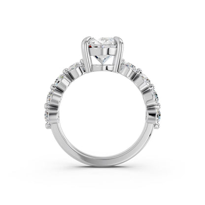 OVAL RING WITH ROUND SIDE STONES