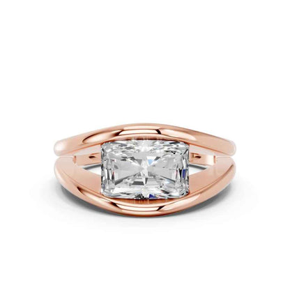 RADIANT E-W FANCY BEZEL RING