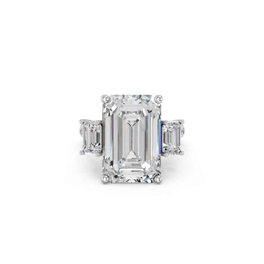 EMERALD THREE STONE RING WITH HIDDEN HALO AND PAVE BAND