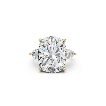 CUSHION THREE STONE RING WITH PEAR SIDE STONES AND HIDDEN HALO