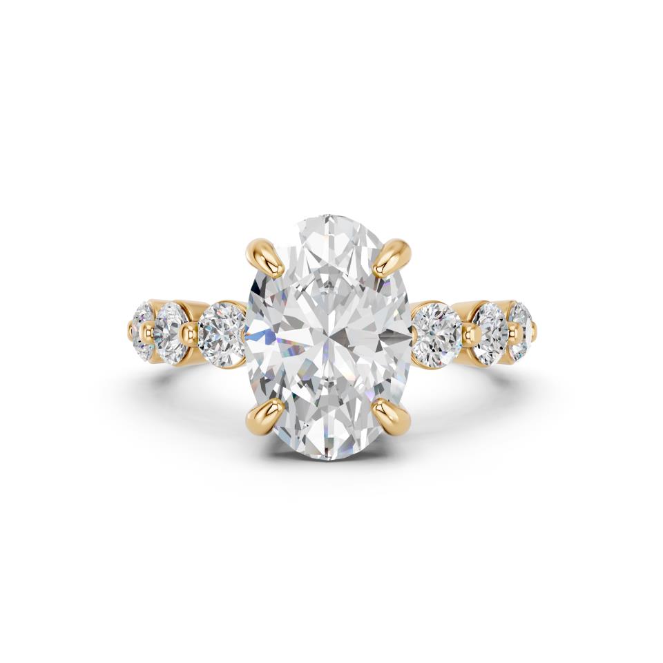 OVAL RING WITH ROUND SIDE STONES