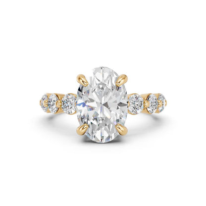 OVAL RING WITH ROUND SIDE STONES