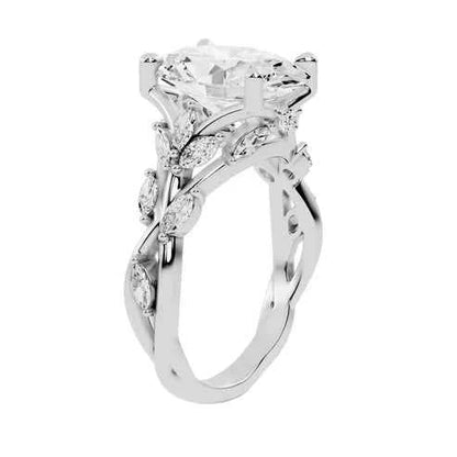OVAL RING WITH MARQUISE SIDE STONES