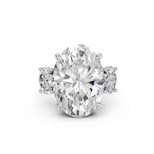 OVAL THREE STONE RING WITH HIDDEN HALO AND PAVE BAND