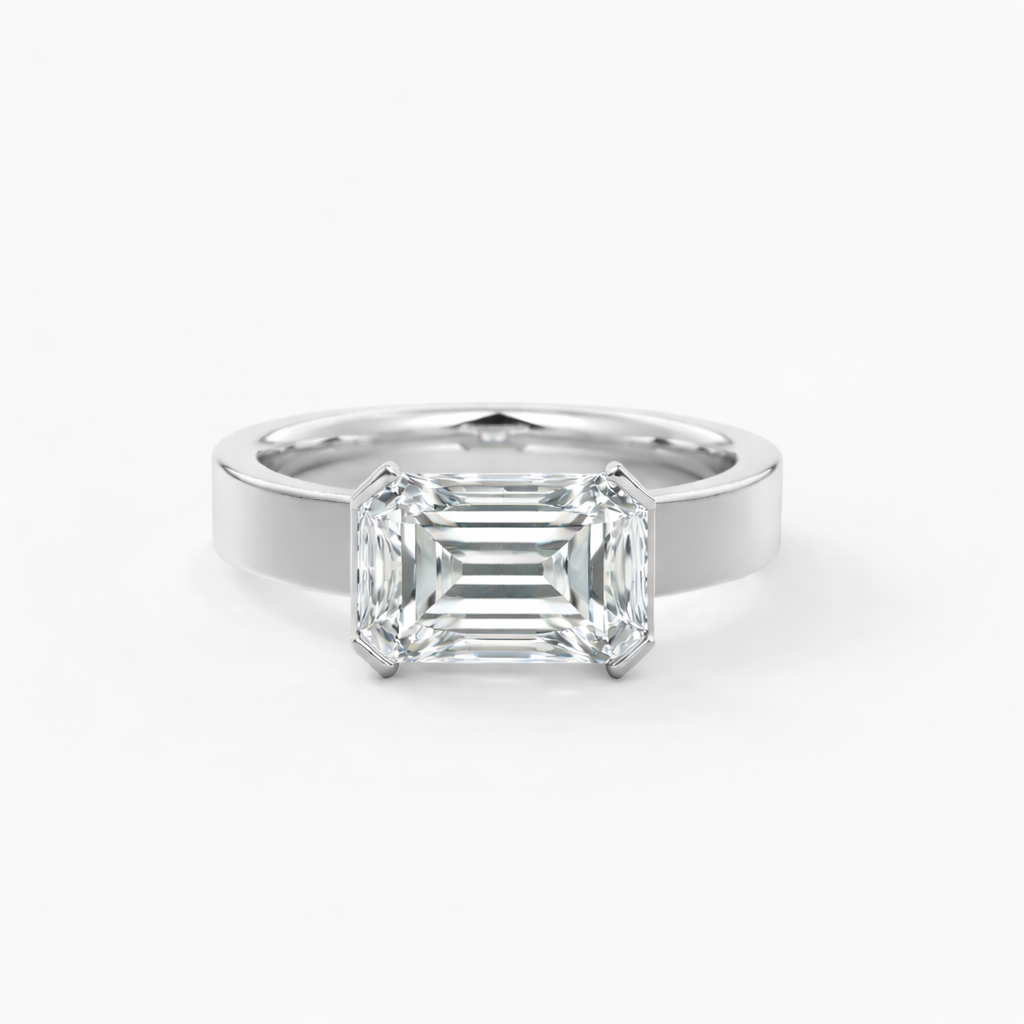 EMERALD EAST WEST RING
