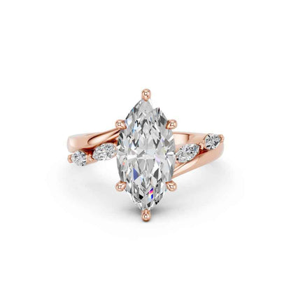 MARQUISE RING WITH SIDE STONES