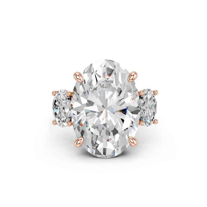 OVAL THREE STONE RING WITH HIDDEN HALO AND PAVE BAND