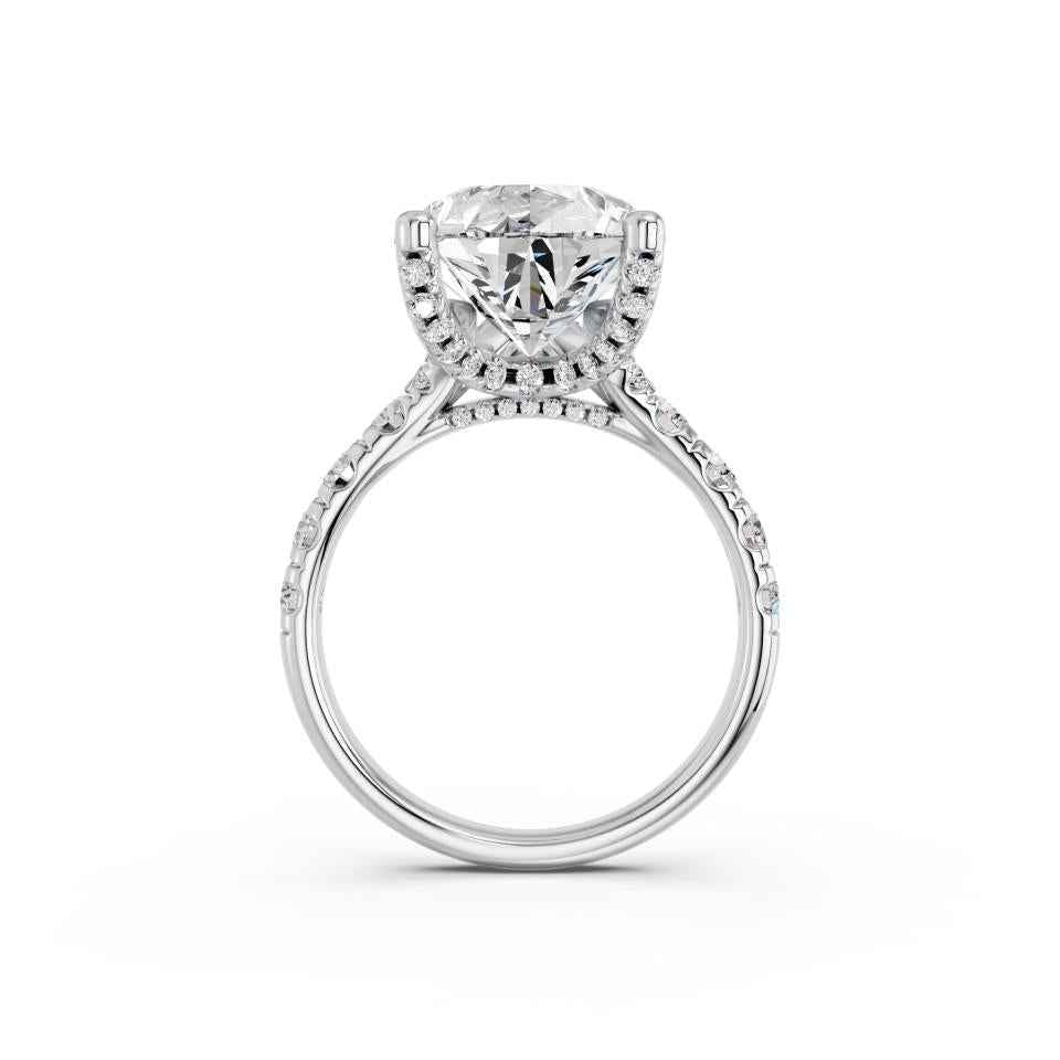 PEAR RING WITH HIDDEN HALO AND PAVE BAND