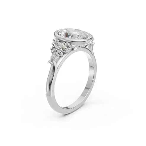 OVAL BEZEL RING WITH HALO SIDE STONES