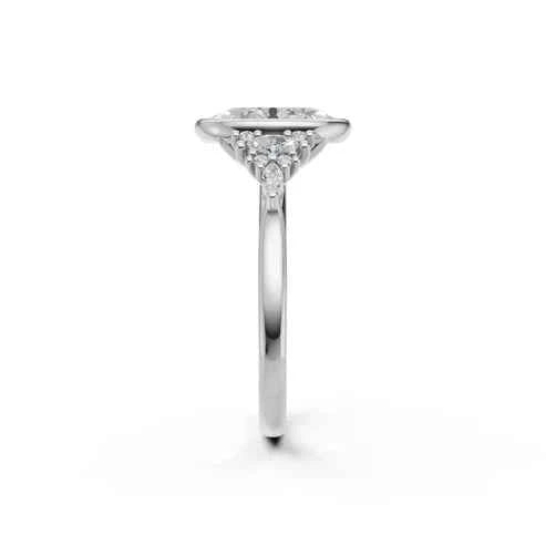 OVAL BEZEL RING WITH HALO SIDE STONES