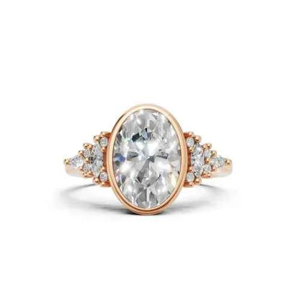 OVAL BEZEL RING WITH HALO SIDE STONES