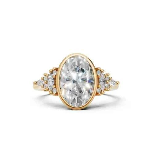 OVAL BEZEL RING WITH HALO SIDE STONES