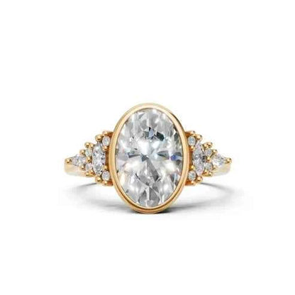 OVAL BEZEL RING WITH HALO SIDE STONES