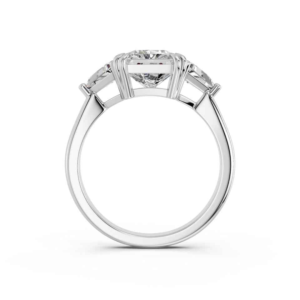 PRINCESS RING WITH TRIANGLE SIDE STONES