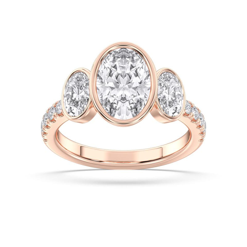 OVAL BEZEL 3 STONE RING