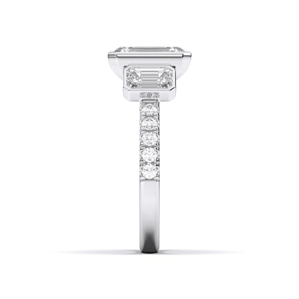 EMERALD BEZEL 3 STONE RING