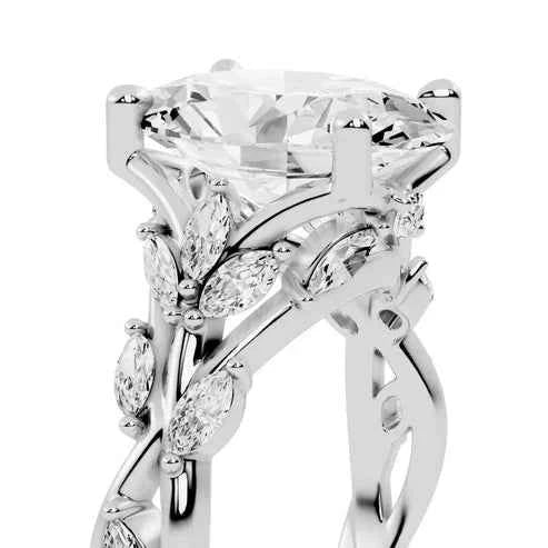 OVAL RING WITH MARQUISE SIDE STONES
