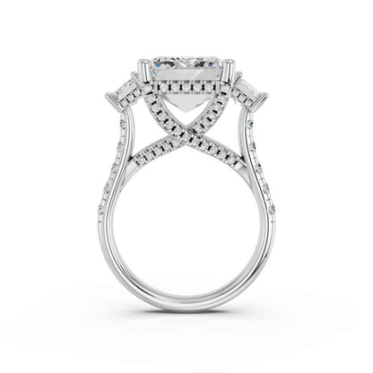 EMERALD THREE STONE RING WITH HIDDEN HALO AND PAVE BAND