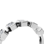 EMERALD BEZEL HALF ETERNITY WEDDING BAND