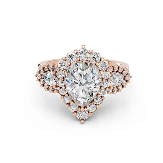 PEAR THREE STONE FANCY RING