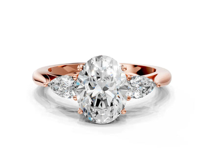 Three-Stone Oval Cut Lab Diamond Solitaire Ring with Tapered Band and Four-Prong Setting| D VS1