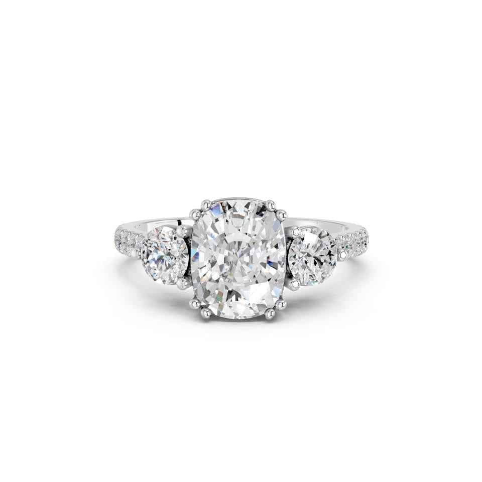 CUSHION THREE STONE WITH PAVE BAND
