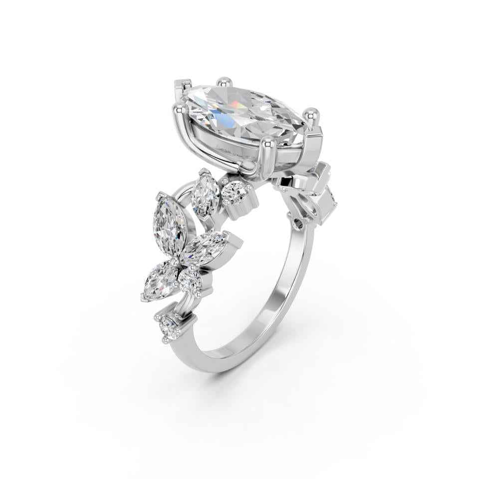 MARQUISE WITH FLORAL SIDE STONES