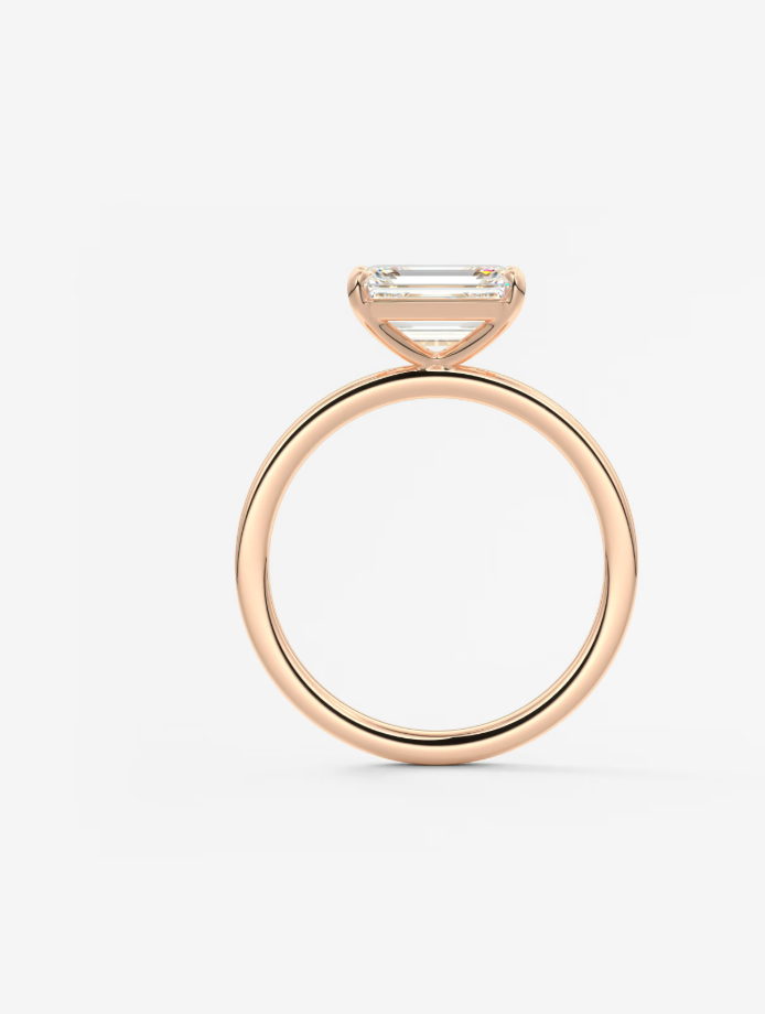 EMERALD EAST WEST RING