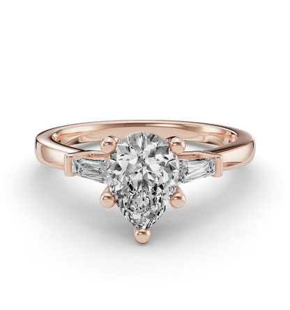 PEAR BAGUETTE THREE STONE RING