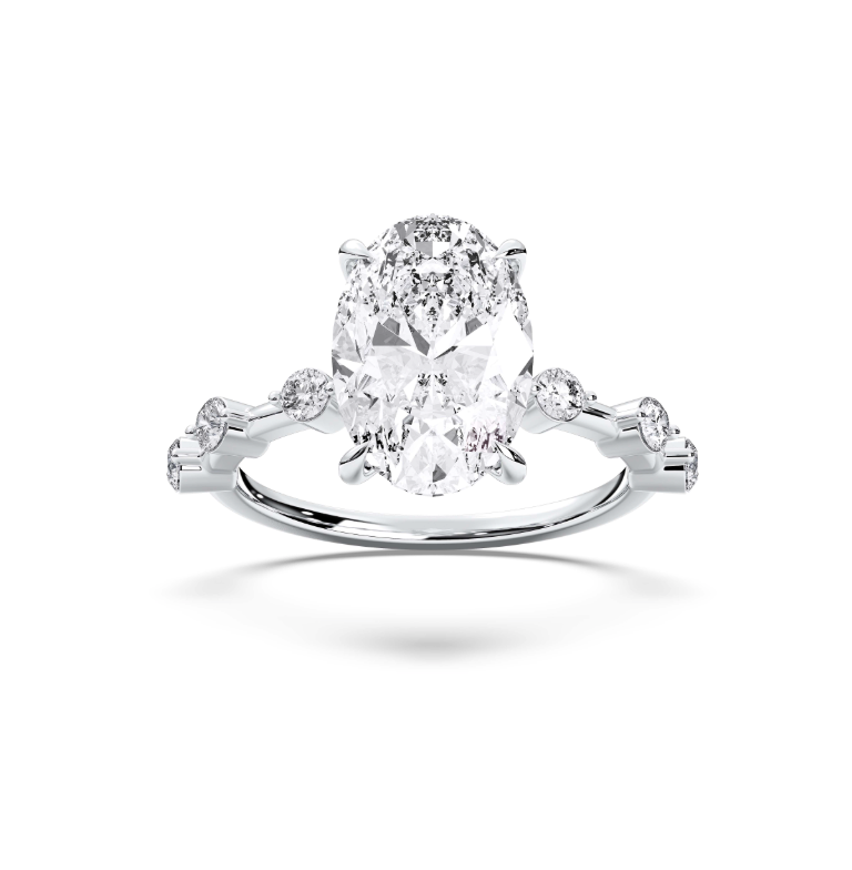 OVAL SIDE STONES RING